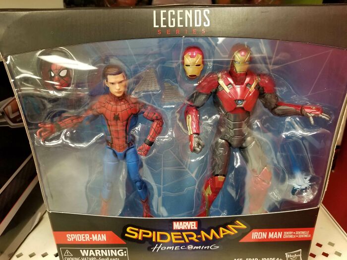 Spider-Man and Iron Man action figures from Marvel Legends series packaged as collectible toys, funny pointless items.