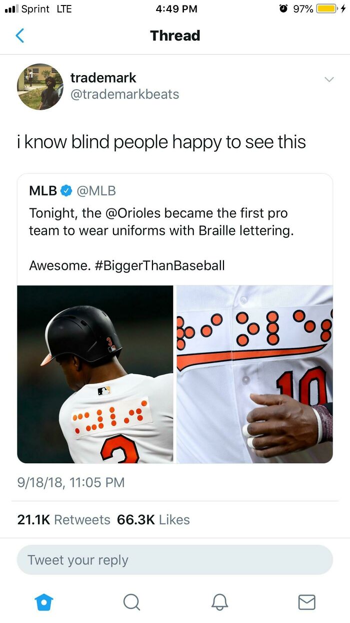 Tweet showing Baltimore Orioles player wearing uniform with Braille lettering, an example of pointless things serving no purpose except being funny.