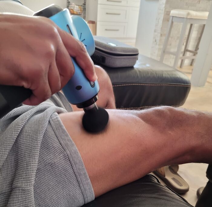 The Symphony Of Grunts And Groans Your Dad Makes Every Time He Gets Out Of A Chair Can Be Officially Silenced By This Massage Gun 