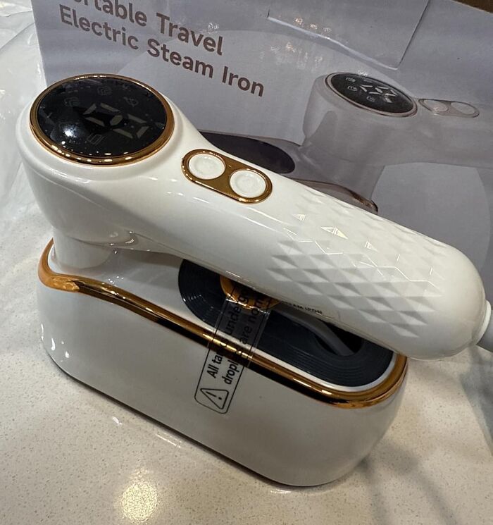 Portable travel electric steam iron with digital display and white and gold design, a perfect gift for mother-in-law.