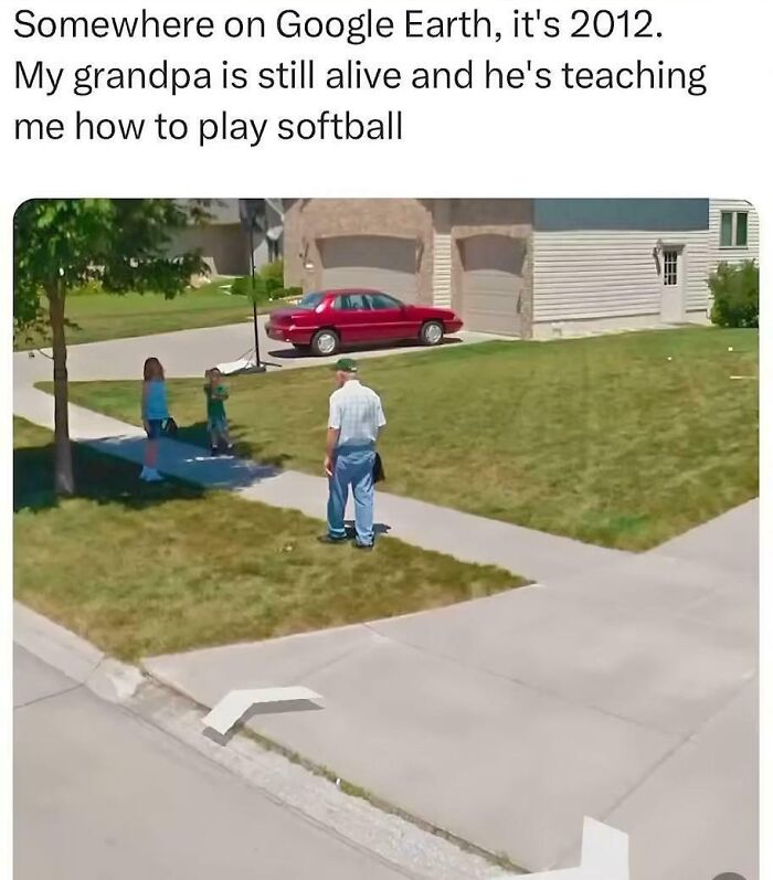 Grandpa teaching child how to play softball outside in neighborhood captured on Google Earth, a heartwarming moment.