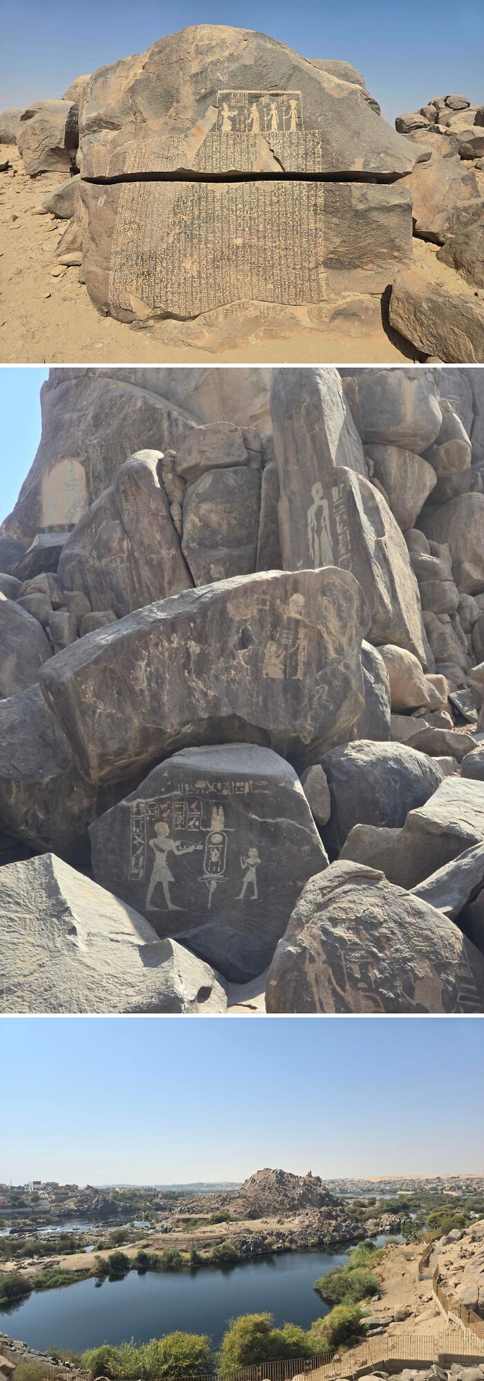 Ancient Egypt rock inscriptions and petroglyphs on desert stones near a river landscape with clear blue sky.