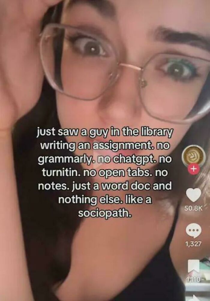 Close-up of a student wearing glasses sharing a college meme about writing assignments with no digital tools or notes.