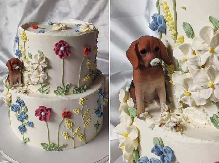 Two-tiered masterfully crafted cake decorated with colorful buttercream flowers and a realistic dog figure.