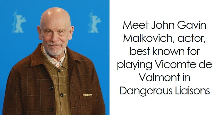 John Malkovich smiling, wearing a brown checkered jacket at a film event with a blue background.