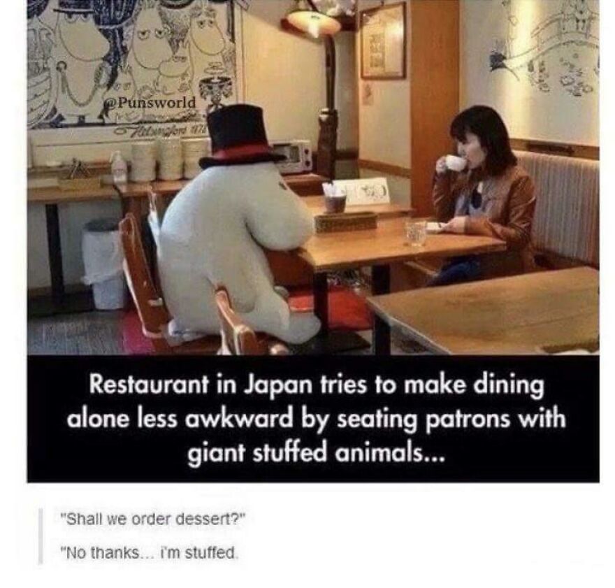 A woman dining with a giant stuffed animal in a Japanese restaurant aiming to reduce awkwardness with humor and angry upvotes.