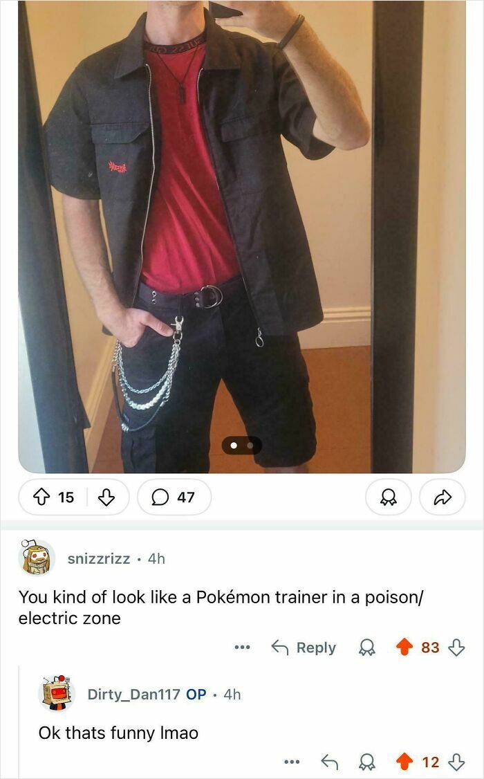 Man in black and red outfit taking a mirror selfie with chain accessories, paired with an epic burn comment on Reddit.