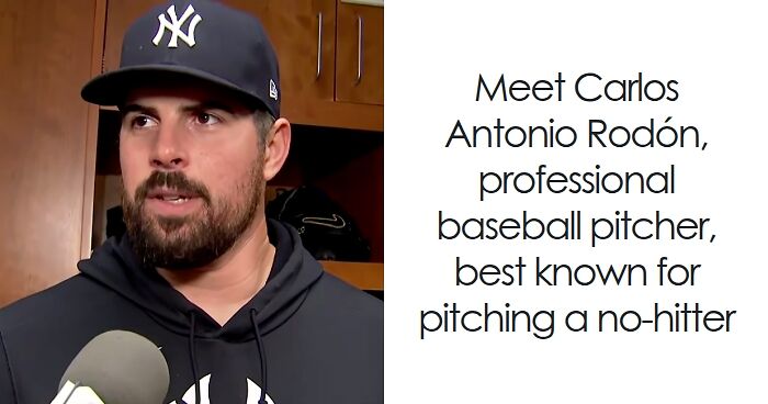 Carlos Rodu00f3n speaking in a locker room interview, wearing a Yankees cap and black hoodie after pitching a no-hitter.