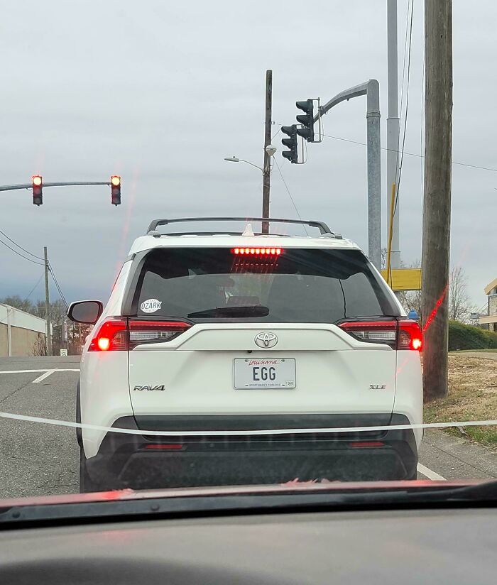 White Toyota RAV4 with a personalized license plate reading EGG, a funny example of hilarious personalized license plates.