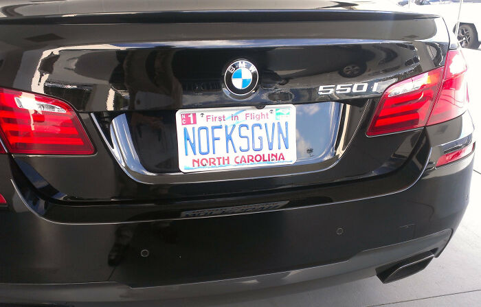 Personalized license plate on a black BMW 550i in North Carolina causing hilarious double takes.