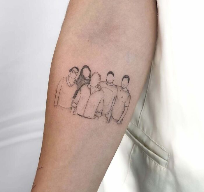 Minimalist family portrait tattoo on forearm, showcasing wholesome tattoos with meaningful little ink design.