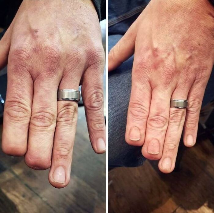 Close-up of hands with subtle finger tattoos visible beneath wedding rings, showcasing wholesome tattoos with meaningful ink.