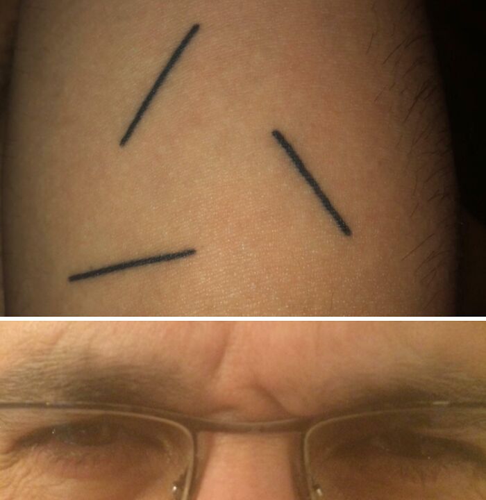 Minimalist wholesome tattoo with three short black lines on skin, showcasing meaningful little ink design. Minimalist wholesome tattoo with three short black lines on skin, showcasing meaningful little ink design.