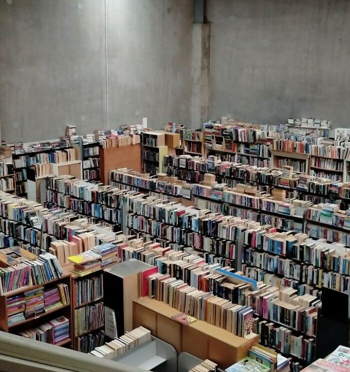 Spacious bookstore with rows of bookshelves filled with various books showcasing different jobs and workplaces.