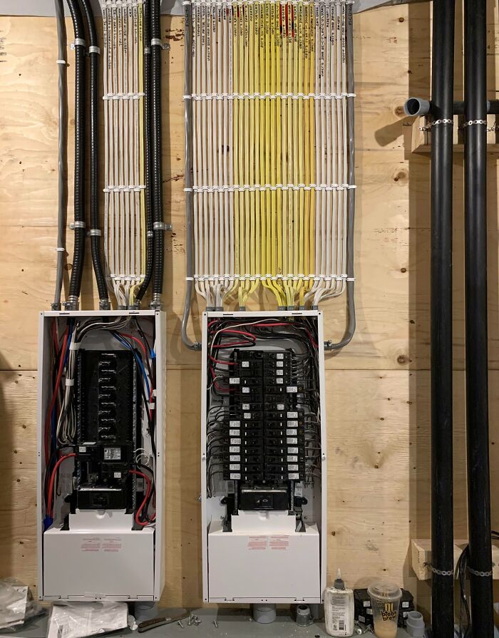 Electrical panels with organized wiring, showcasing skilled work in jobs that make a 9-to-5 more bearable.