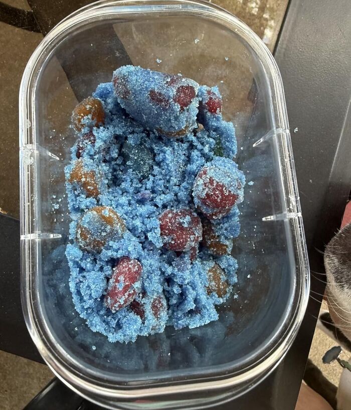 Container filled with blue sugar-coated wacky foods, a quirky gift idea for the snack-obsessed friend.