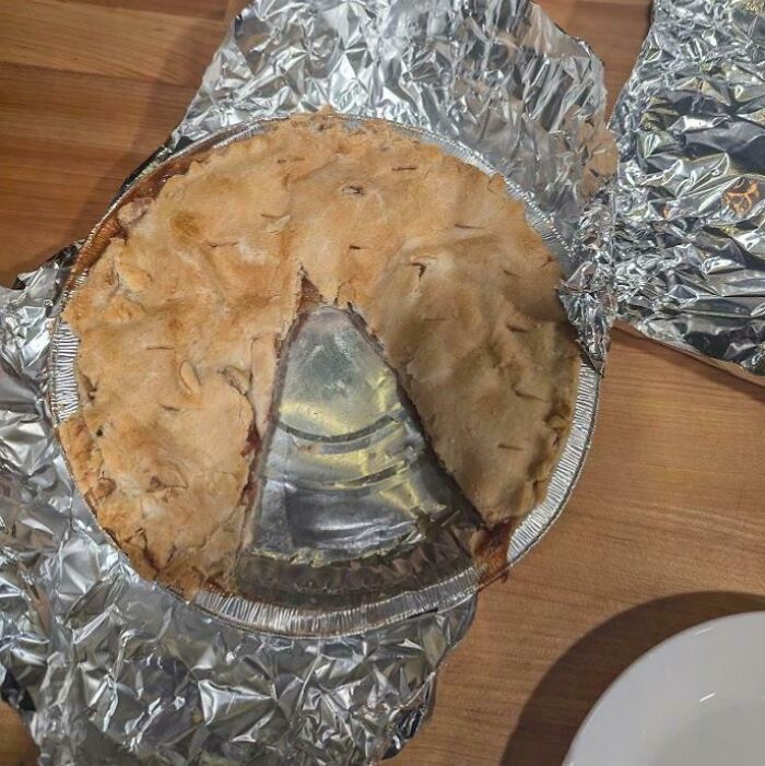 Pie with a missing slice perfectly measuring one-third of the whole, illustrating a weirdest math problem solution.