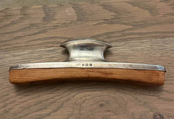 Vintage wooden and metal antique hand tool with hallmark stamps, one of the most bizarre things people received as Christmas gifts.