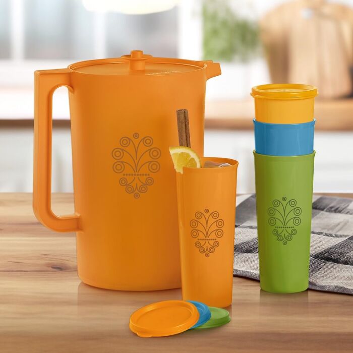  Every Beverage Tastes Significantly More Like Their Grandmother's Kitchen When They Pour It From The Heritage Tupperware Jug And Cups Even If The Liquid Inside Isn't Neon Orange Sugar Water