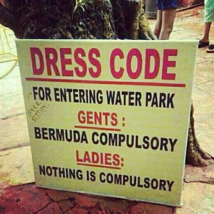 Funny stupid sign at water park showing dress code for gents and ladies with humorous instructions.
