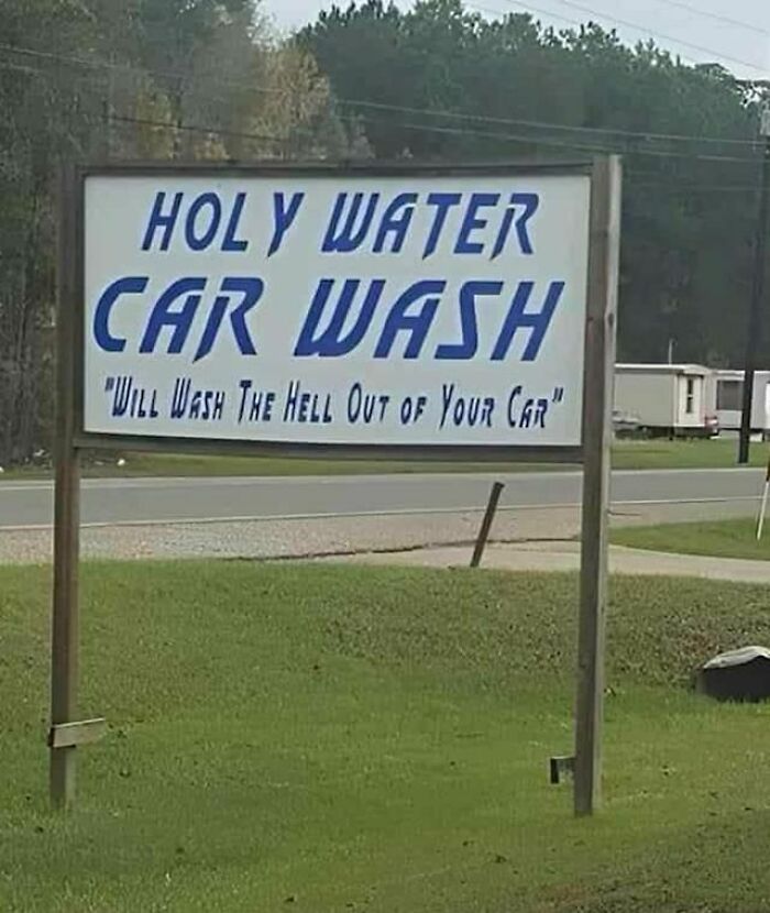 Funny stupid signs pic showing a car wash sign with the humorous phrase Will Wash The Hell Out Of Your Car.