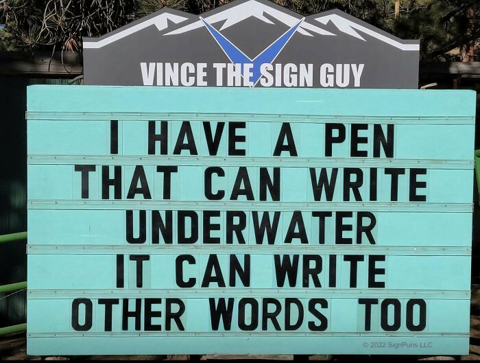 Funny stupid signs pic showing a humorous message about a pen that writes underwater and other words too.