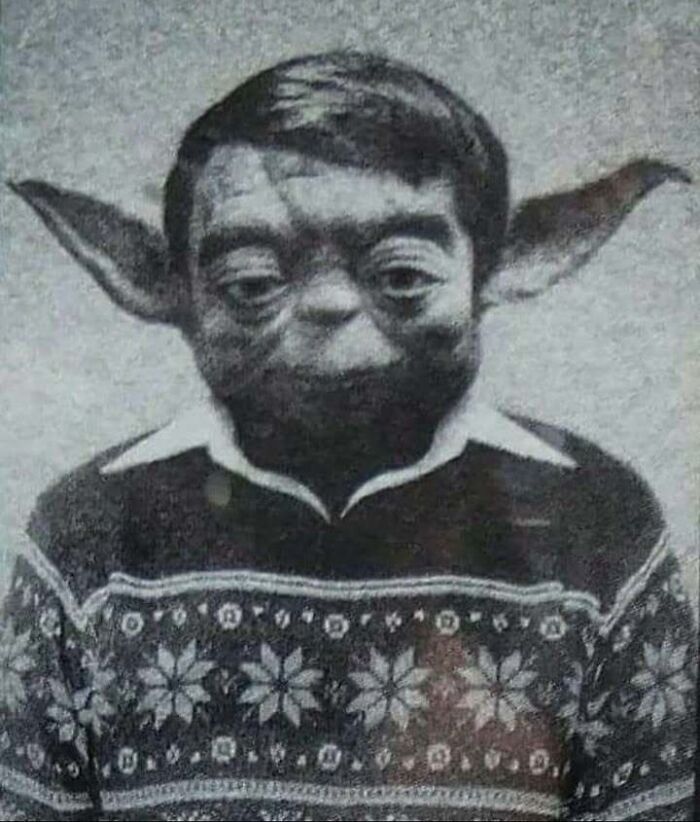Black and white surreal Eastern Europe meme showing a person with Yoda ears and vintage sweater, reflecting nostalgic humor.