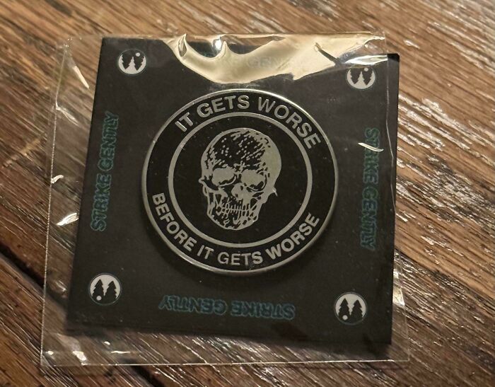 Round pin badge with skull and text It gets worse before it gets worse, an example of bad Secret Santa gifts received.