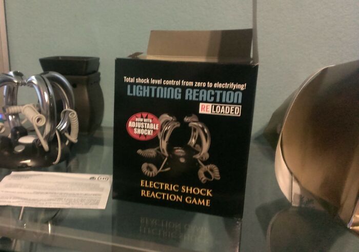 Electric shock reaction game in its box, featured as one of the hilariously bad Secret Santa gifts received by people.