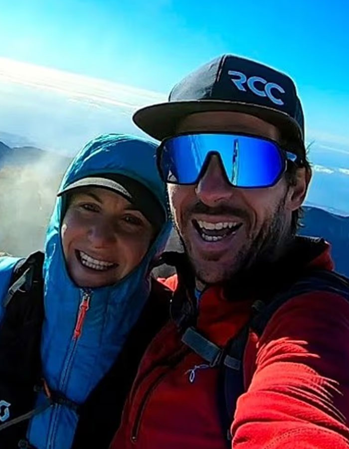 Couple in outdoor gear smiling during a mountain hike, related to woman abandoned to fatally freeze on Austria’s highest peak. Couple in outdoor gear smiling during a mountain hike, related to woman abandoned to fatally freeze on Austria’s highest peak.