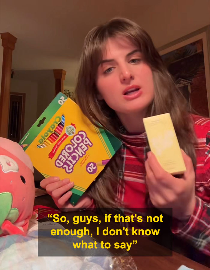 Woman holding dollar store colored pencils and other items sparking backlash over child’s Angel Tree haul choices Woman holding dollar store colored pencils and other items sparking backlash over child’s Angel Tree haul choices