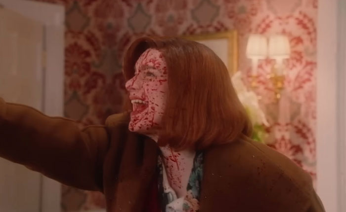 Woman with blood-splattered face in a horror scene from SNL’s Home Alone parody starring Ariana Grande. Woman with blood-splattered face in a horror scene from SNL’s Home Alone parody starring Ariana Grande.