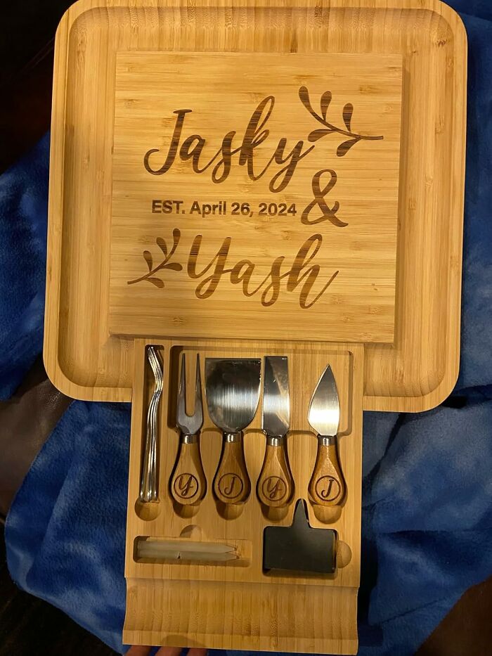 Personalized bamboo cheese board and knife set engraved with names, a unique custom gift idea for Christmas.