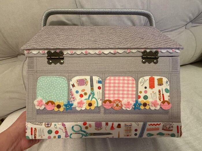 Decorative sewing basket with applique details, perfect gift idea from a Hobby Lobby isle for creative friends.