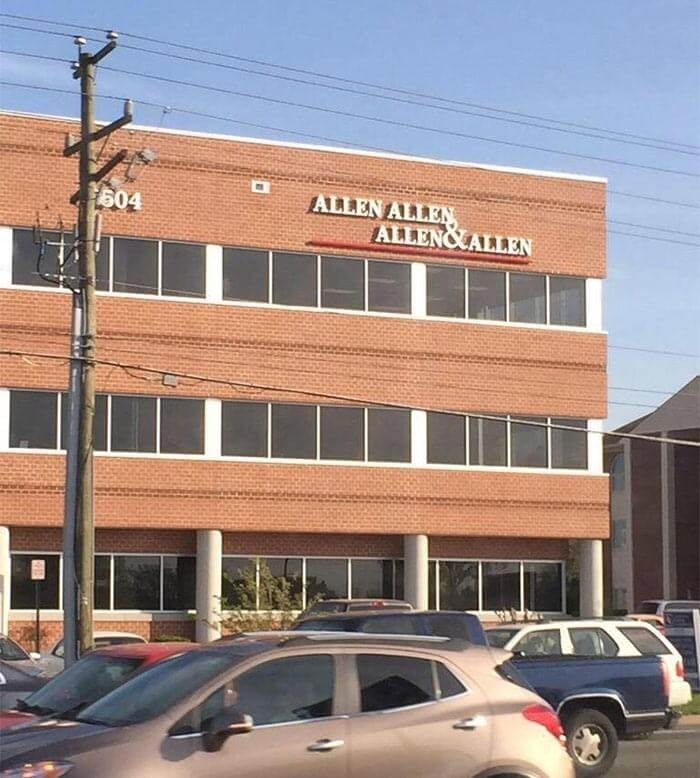 Brick office building with the sign Allen Allen Allen and Allen and parked cars, a random pic that makes you laugh.