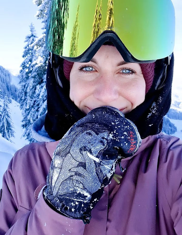 Young woman smiling in ski gear on a snowy mountain, related to woman abandoned to fatally freeze on Austria’s peak. Young woman smiling in ski gear on a snowy mountain, related to woman abandoned to fatally freeze on Austria’s peak.