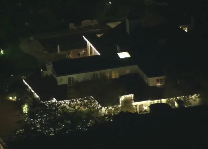 Aerial nighttime view of a house with holiday lights, illustrating MAGA hypocrisy discussions related to Rob Reiner and Charlie Kirk. Aerial nighttime view of a house with holiday lights, illustrating MAGA hypocrisy discussions related to Rob Reiner and Charlie Kirk.