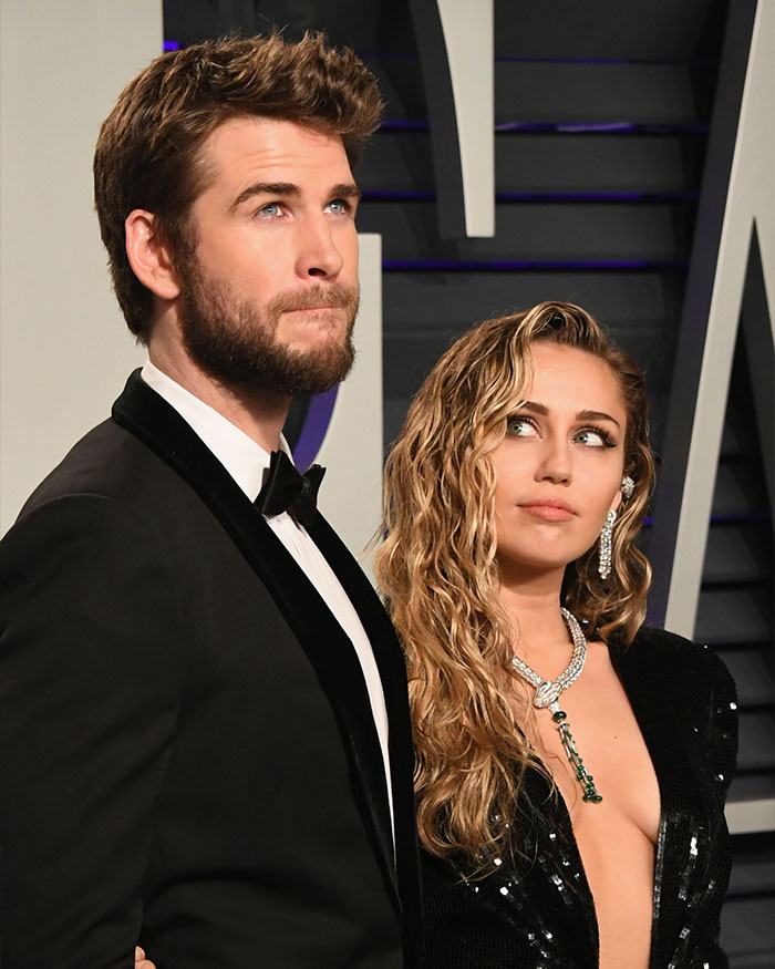 Miley Cyrus and Maxx Morando at an event, dressed elegantly, sparking mixed reactions about their engagement. Miley Cyrus and Maxx Morando at an event, dressed elegantly, sparking mixed reactions about their engagement.