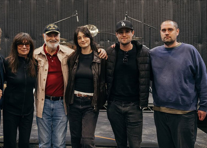 Group of five people posing together indoors, highlighting Rob Reiner’s son amid a serious family-related news event. Group of five people posing together indoors, highlighting Rob Reiner’s son amid a serious family-related news event.