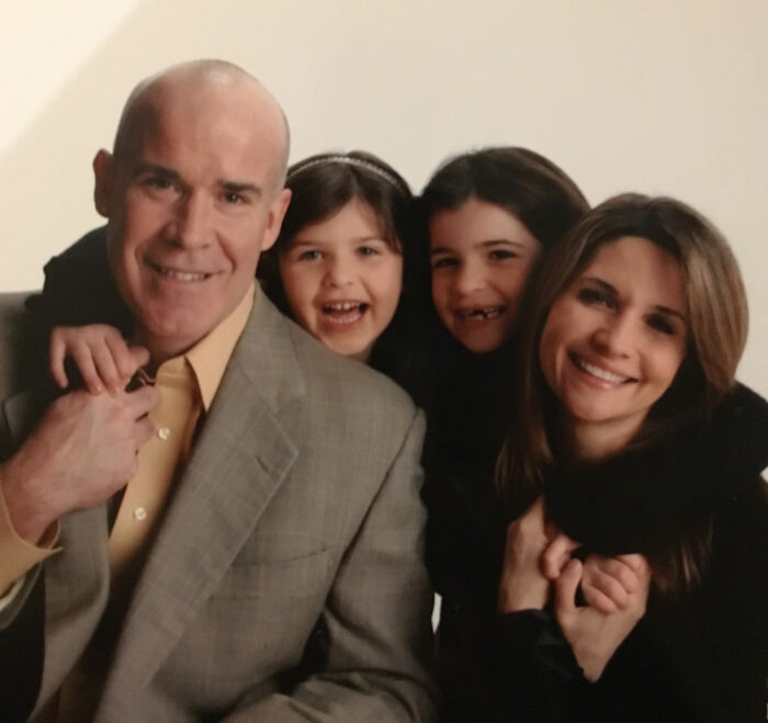 Family portrait showing parents and two daughters smiling together in a warm setting, related to sorority girl tragic accident. Family portrait showing parents and two daughters smiling together in a warm setting, related to sorority girl tragic accident.