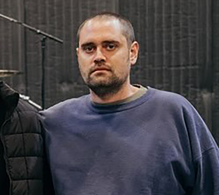 Man with short hair and beard wearing a blue sweatshirt, depicting Nick Reiner from explosive fight with dad incident. Man with short hair and beard wearing a blue sweatshirt, depicting Nick Reiner from explosive fight with dad incident.