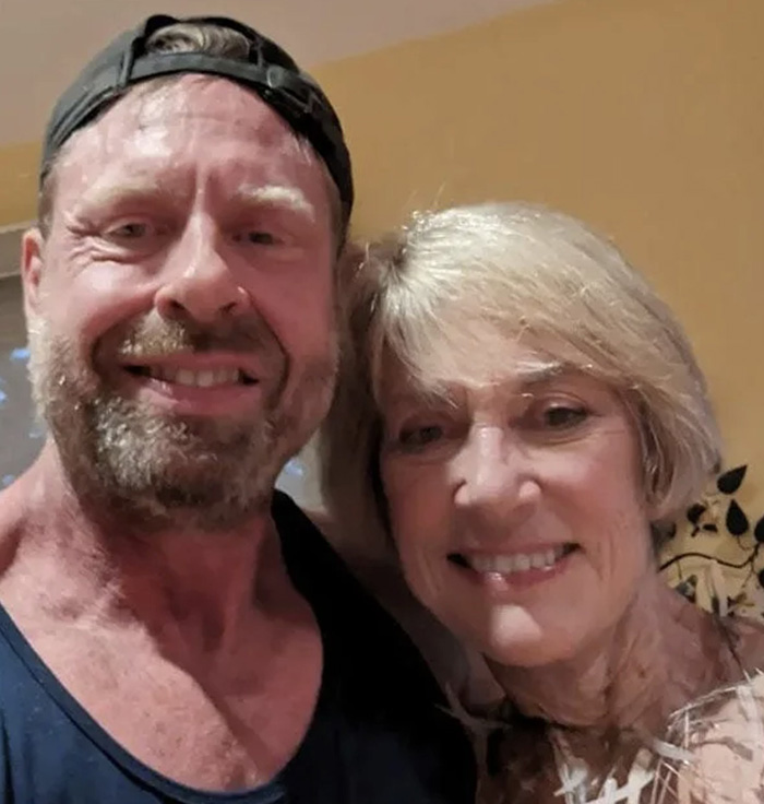 Man and woman smiling together indoors, highlighting ChatGPT accused of turning son against mother in viral story. Man and woman smiling together indoors, highlighting ChatGPT accused of turning son against mother in viral story.