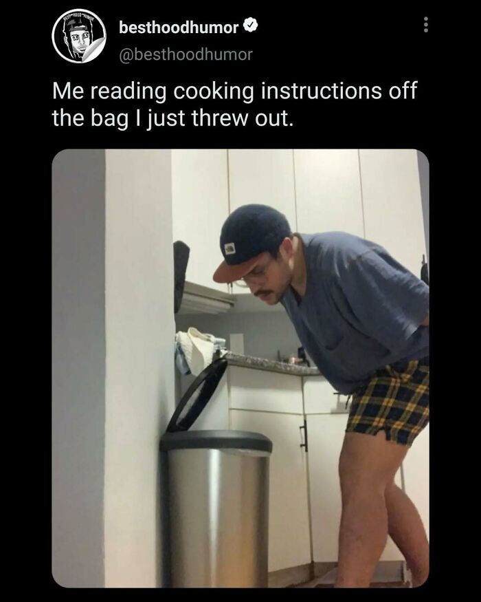 Man humorously reading cooking instructions from a trash can, illustrating relatable memes that have no reason to be this funny.
