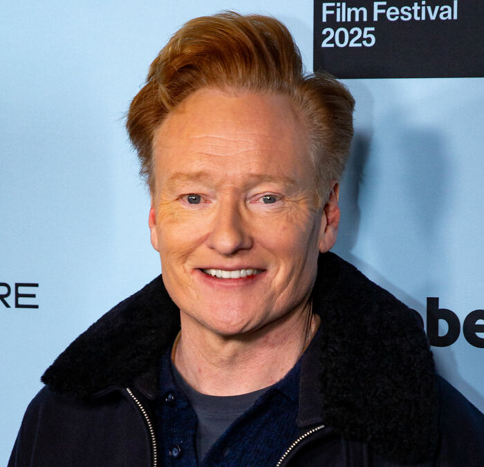 Man with red hair smiling at a film festival, related to Rob Reiner&rsquo;s son Nick and a tense moment with Bill Hader.