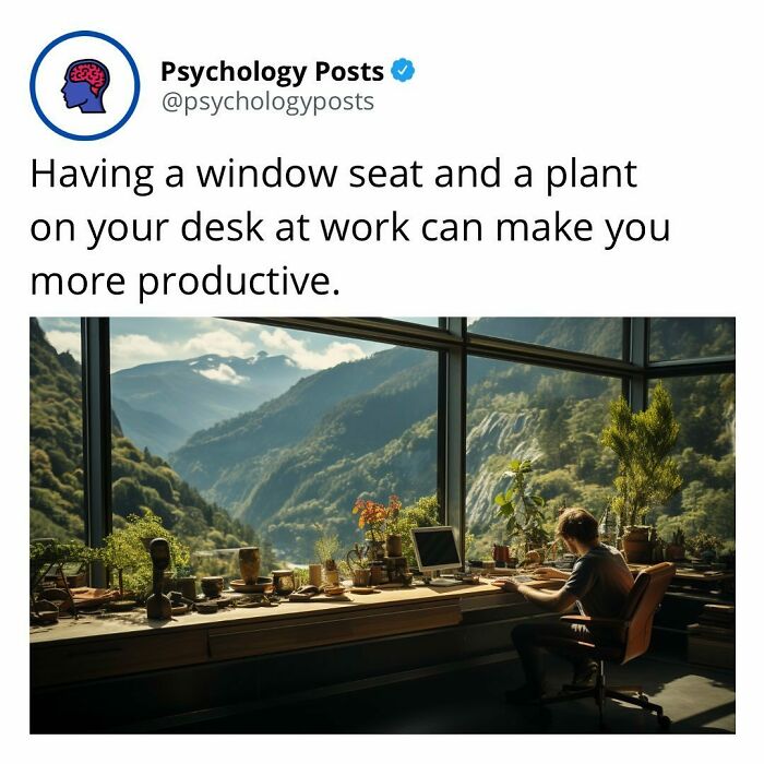 Person working at a desk with plants by a large window, illustrating fun and fascinating psychology facts about productivity.