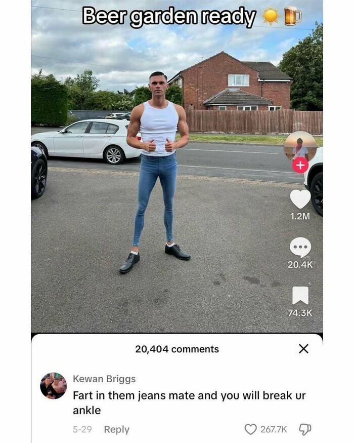 Man wearing extremely tight jeans standing on a street, featured in a random meme to spice up life humor.