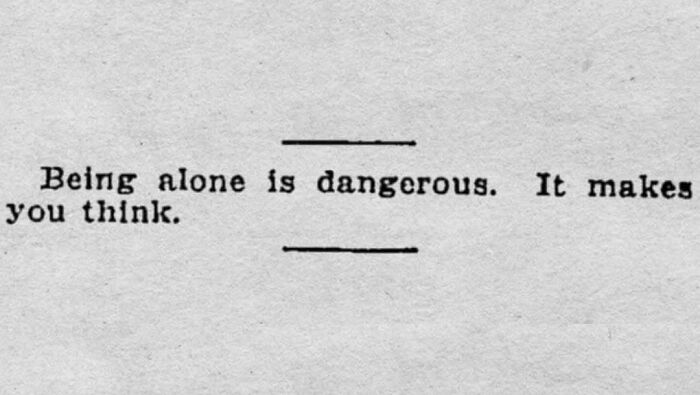Vintage newspaper clippings with typed text stating being alone is dangerous and makes you think.