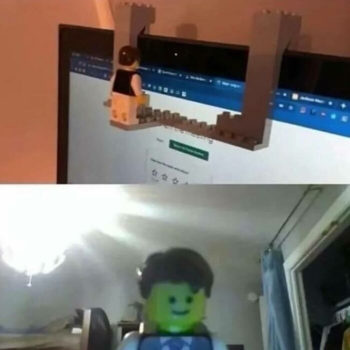 Lego meme showing a brick figure interacting with a computer screen and a smiling Lego head toy indoors.
