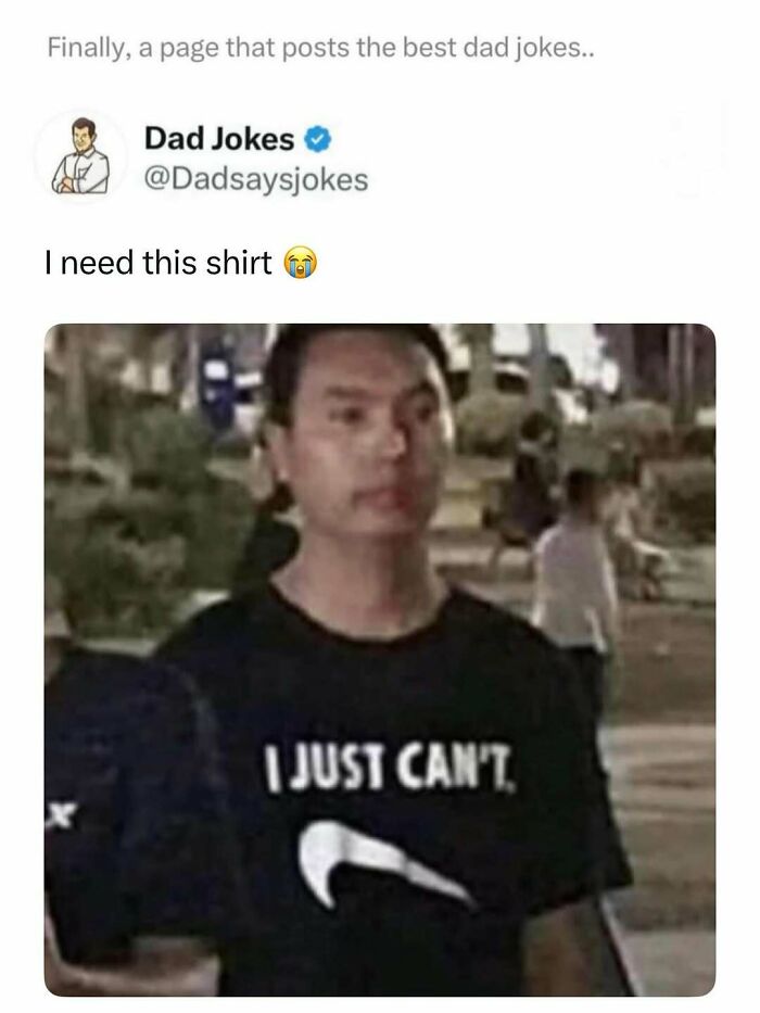 Man wearing a black shirt with a swoosh logo and text, related to funny dad jokes from a dedicated joke account.