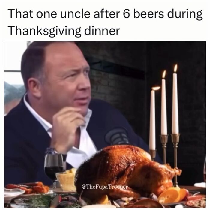 Man reacting humorously at Thanksgiving dinner with turkey, candles, and drinks, creating a funny meme to spice up life.